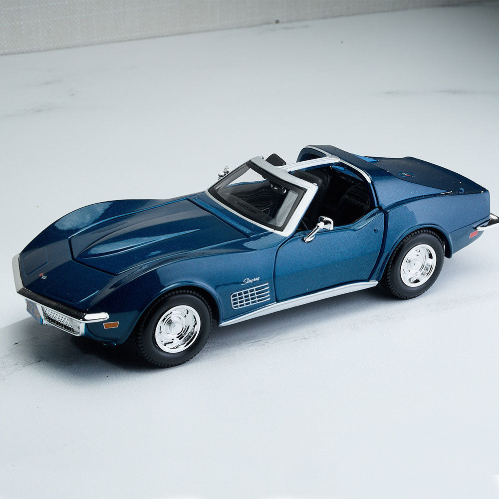 1970 Blue Corvette Diecast Model sitting on a table