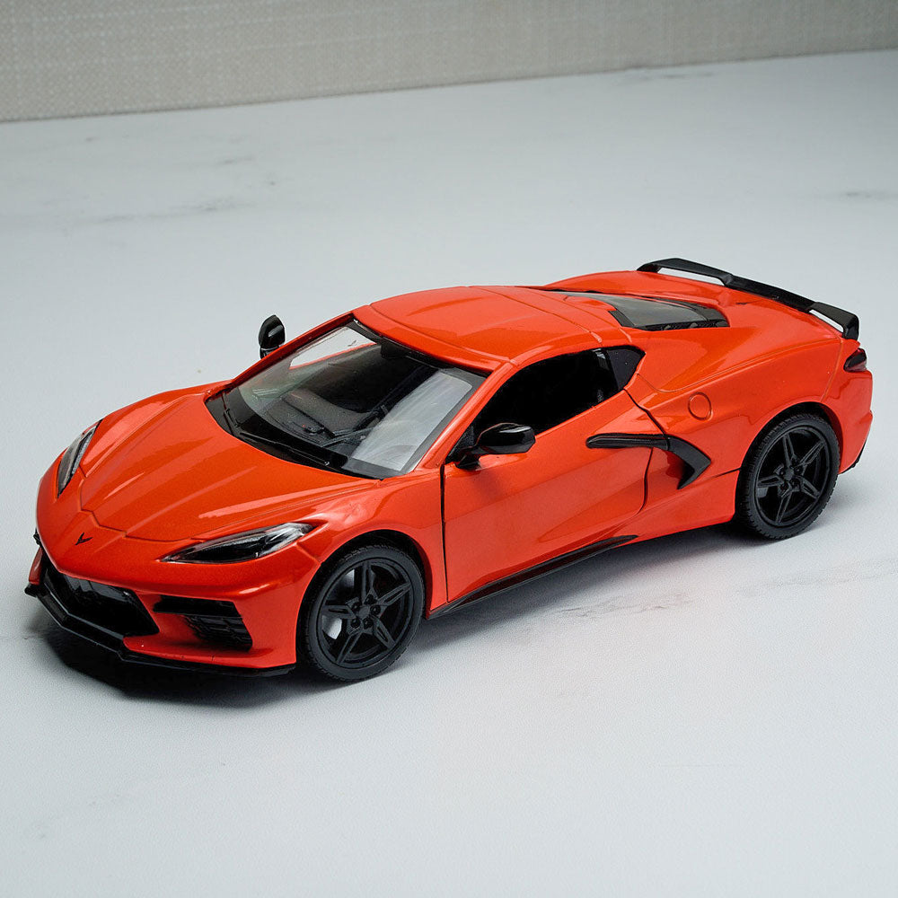 2020 Corvette Orange Diecast Model displayed on a table