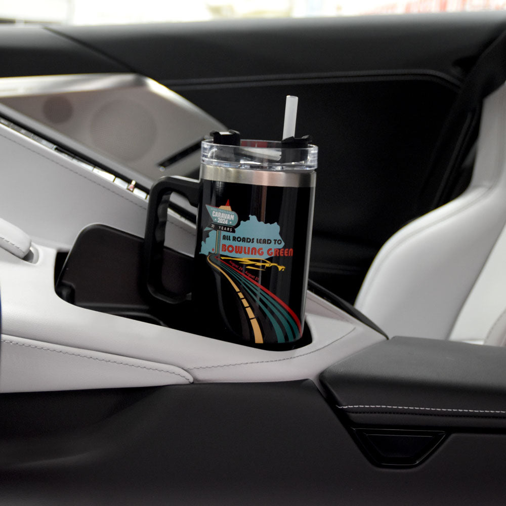 2024 NCM Caravan Tumbler shown inside the Corvette in a cupholder