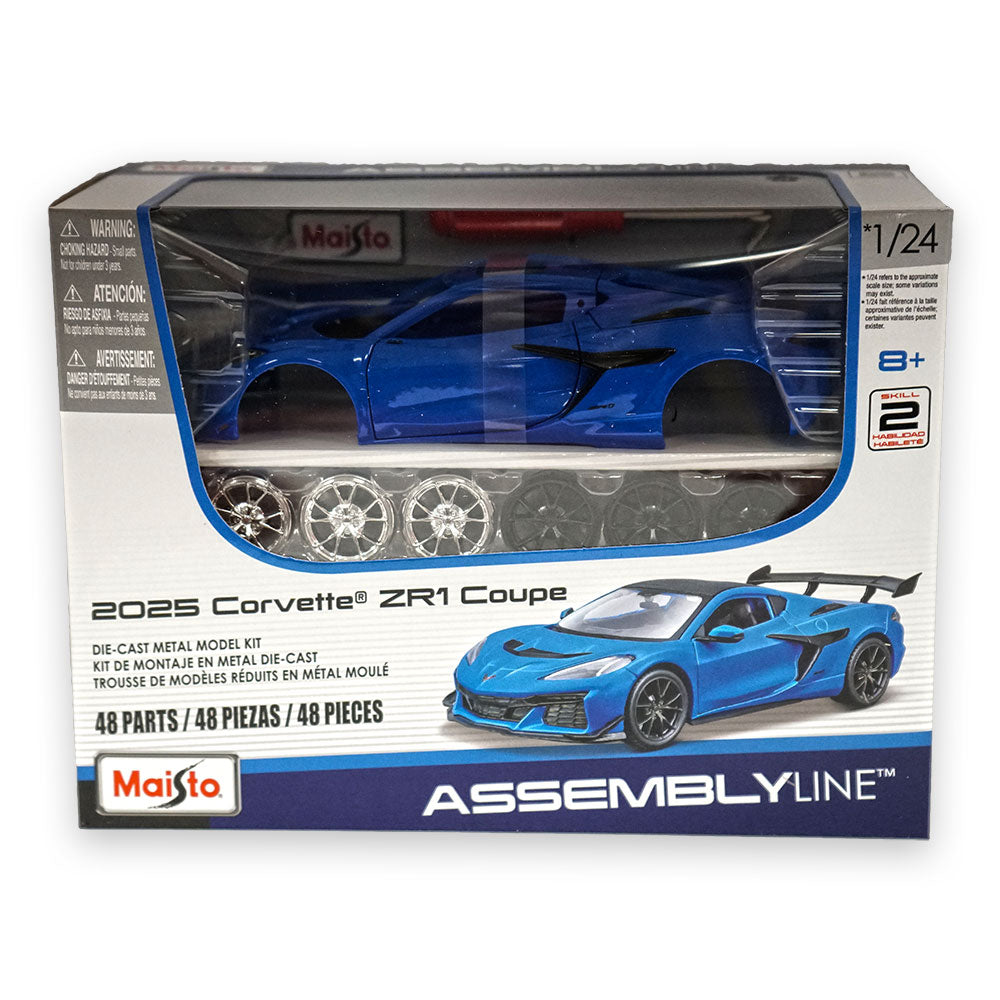 The 2025 Corvette ZR1 in Blue Assembly Line Diecast Metal Model Kit shown in the package on a white background.