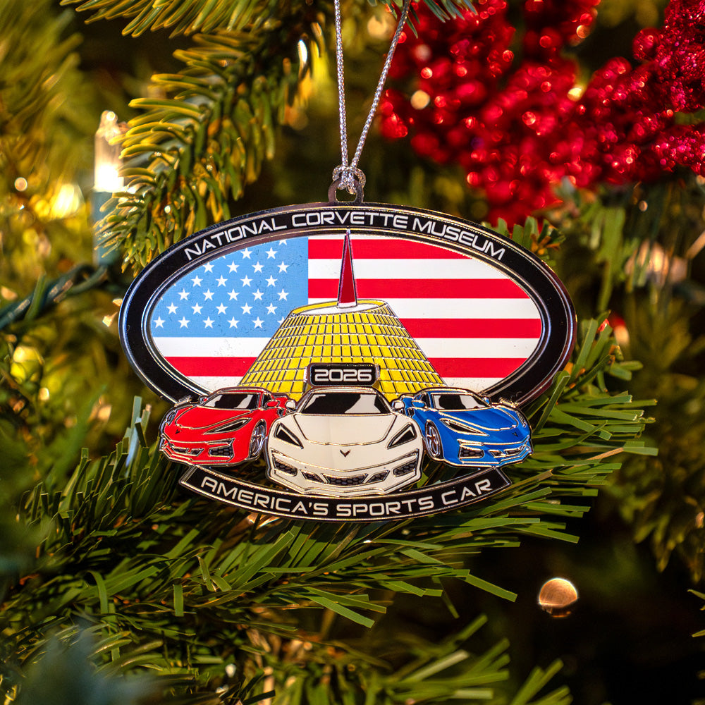 2026 National Corvette Museum Collector's Christmas ornament hanging on a decorated tree.