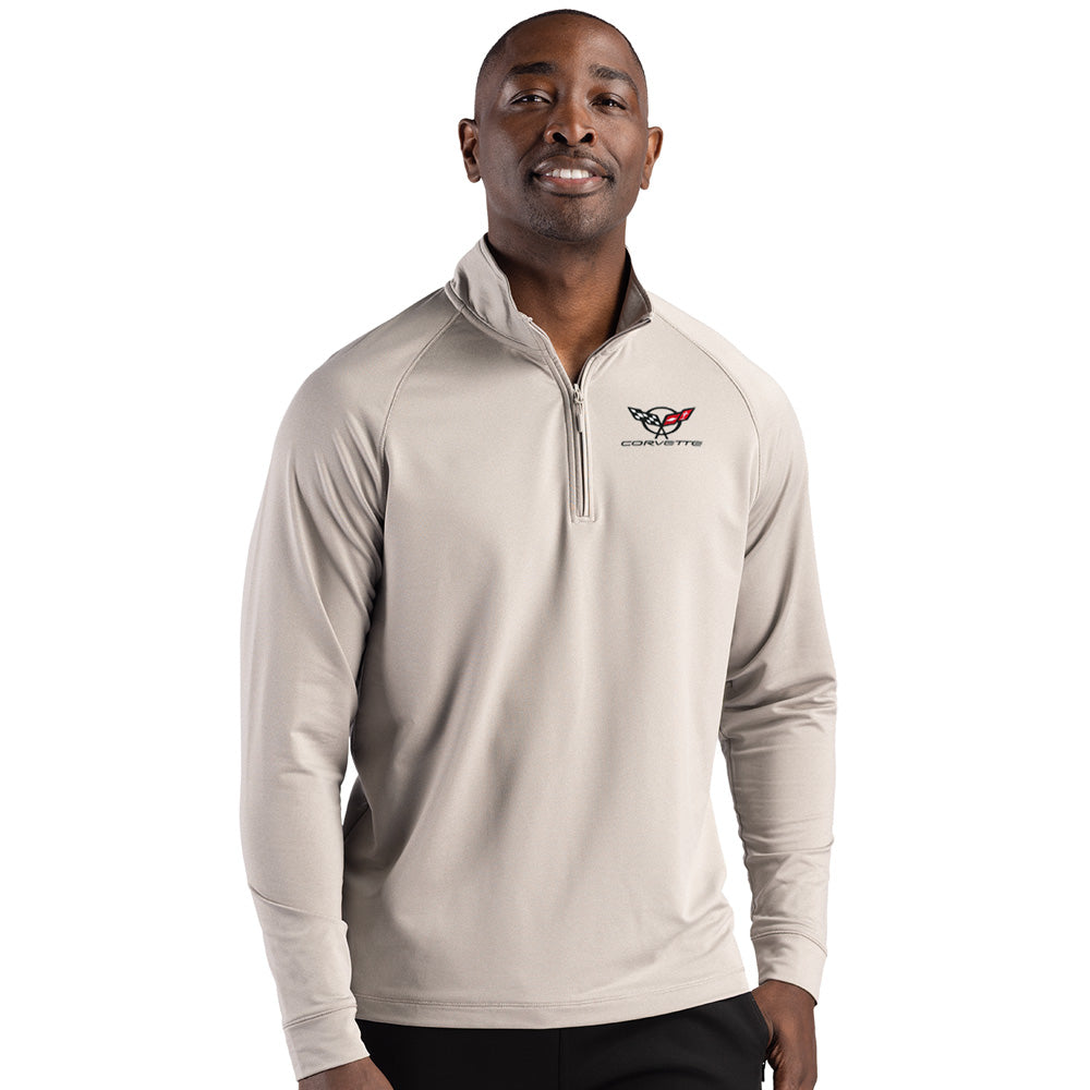 Man wearing a gray long-sleeve pullover with a C5 Corvette emblem on the left chest on a white background