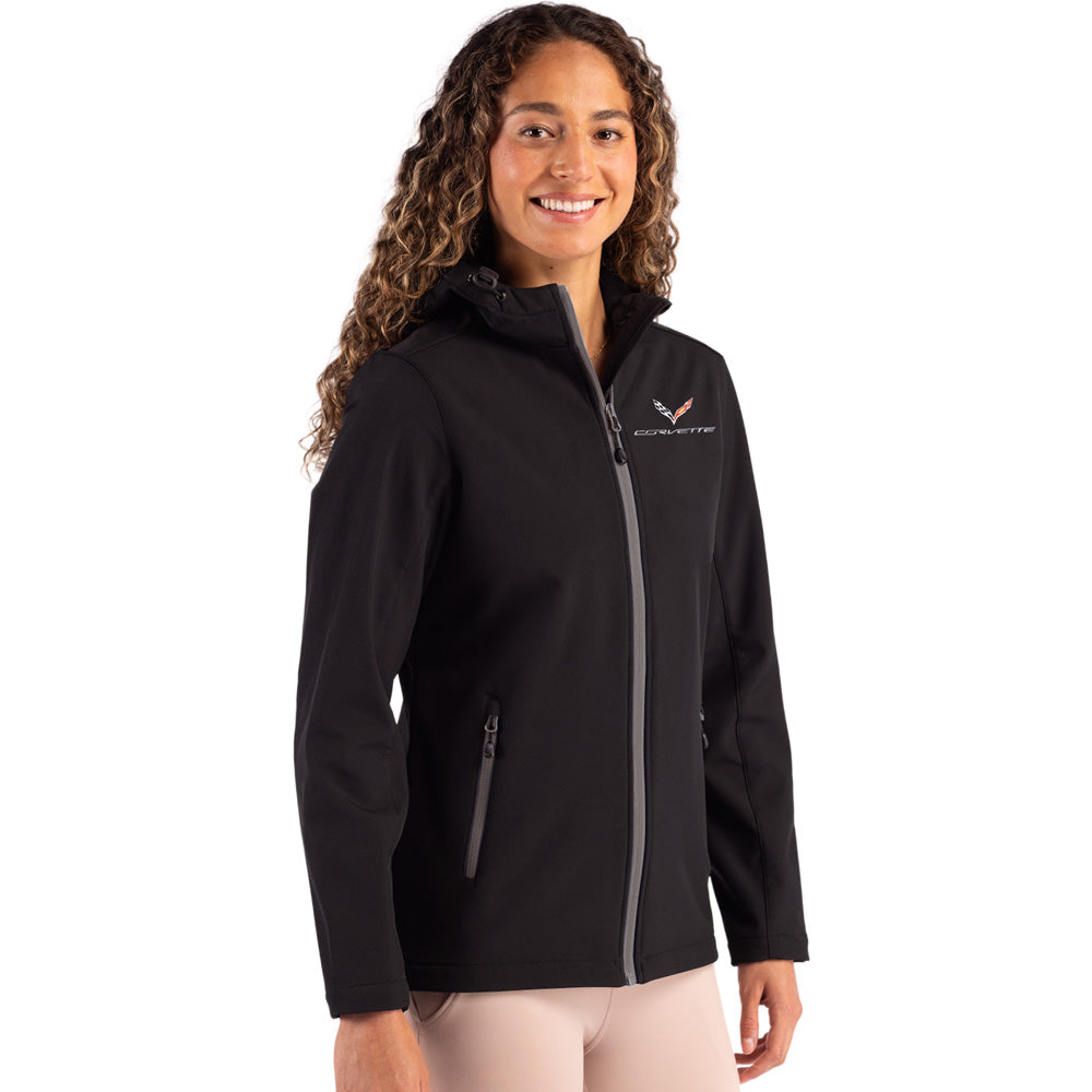 Woman wearing a black Corvette jacket with a C7 logo on the left chest shown on a white background