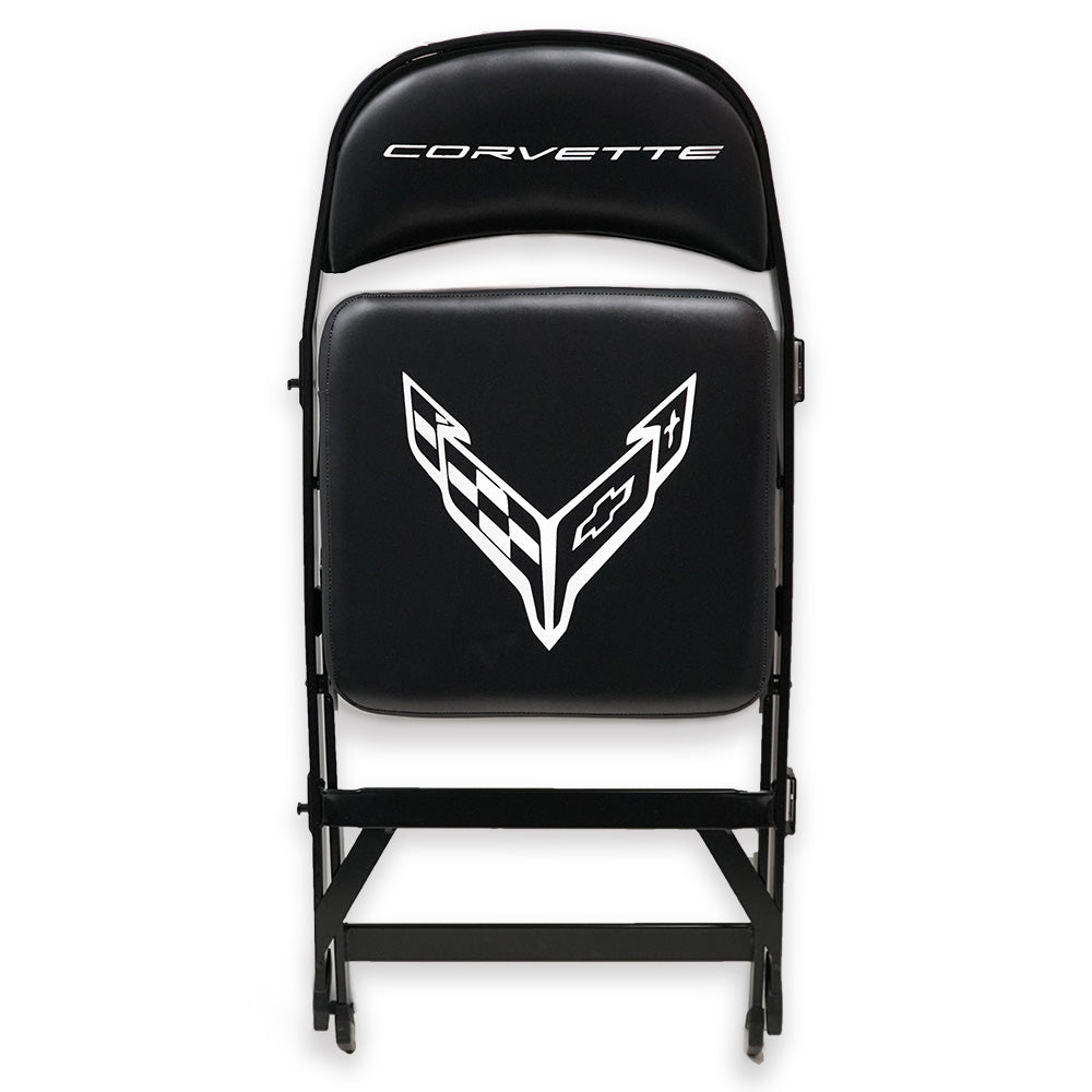 Black folding chair with a C8 Corvette logo shown folded up on a white background
