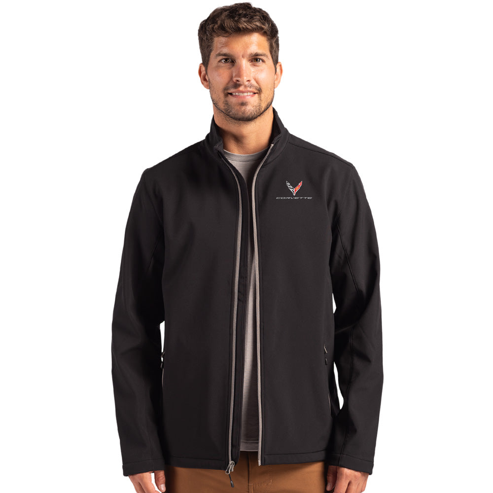 Man wearing a black jacket with a C8 Corvette emblem on white background