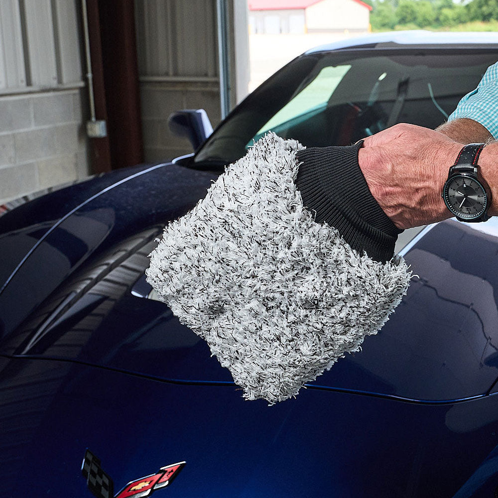 Man wearing the Adams Microfiber Wash Mitt