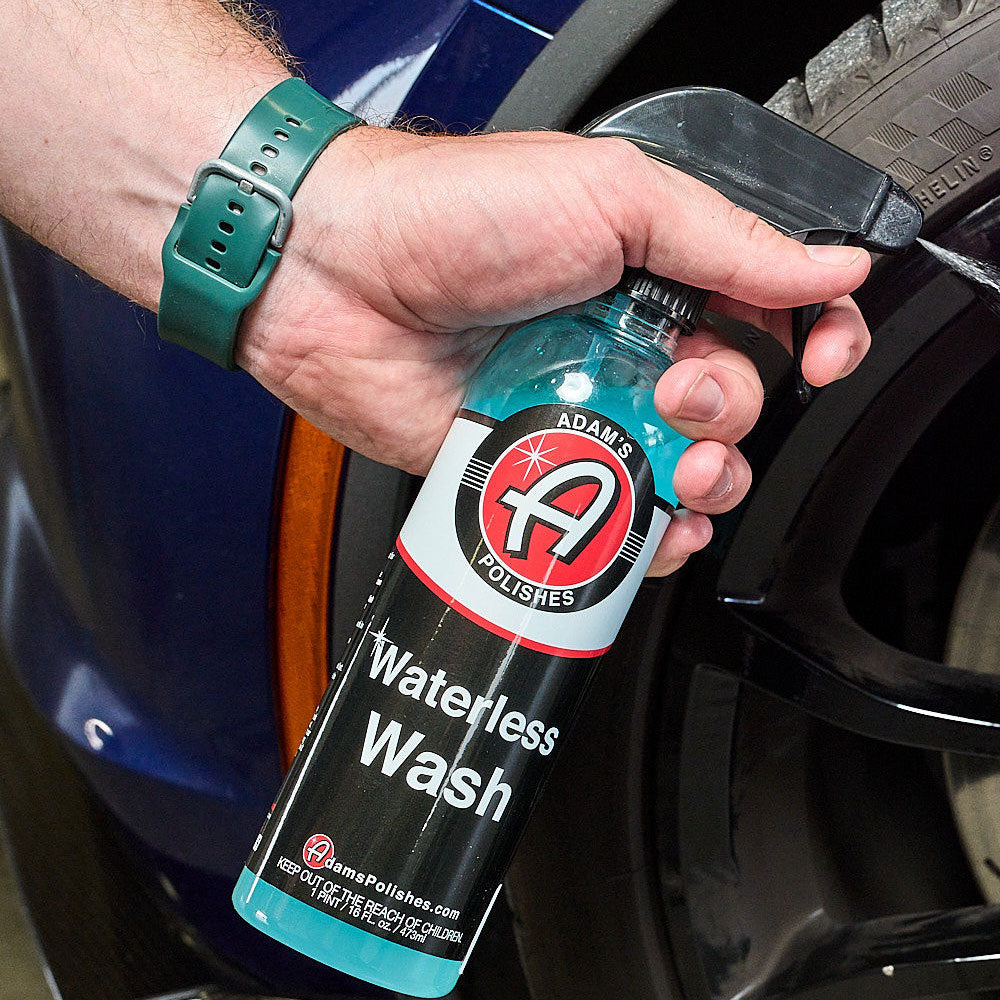 Adams Waterless Wash spraying on a car