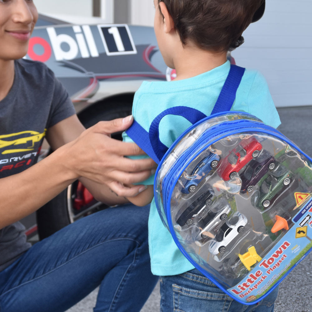 Child wearing the Backpack Play Set