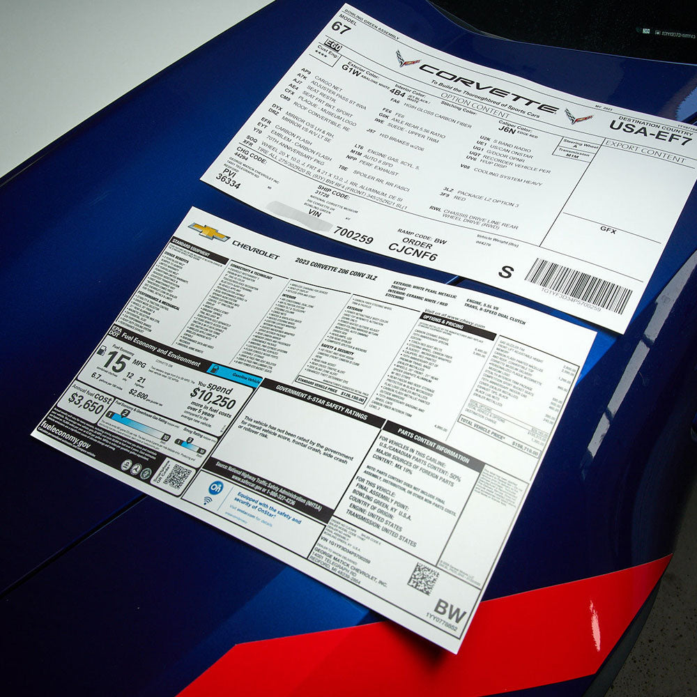 Corvette Build Sheet and Window Sticker Combo Laying on a Car