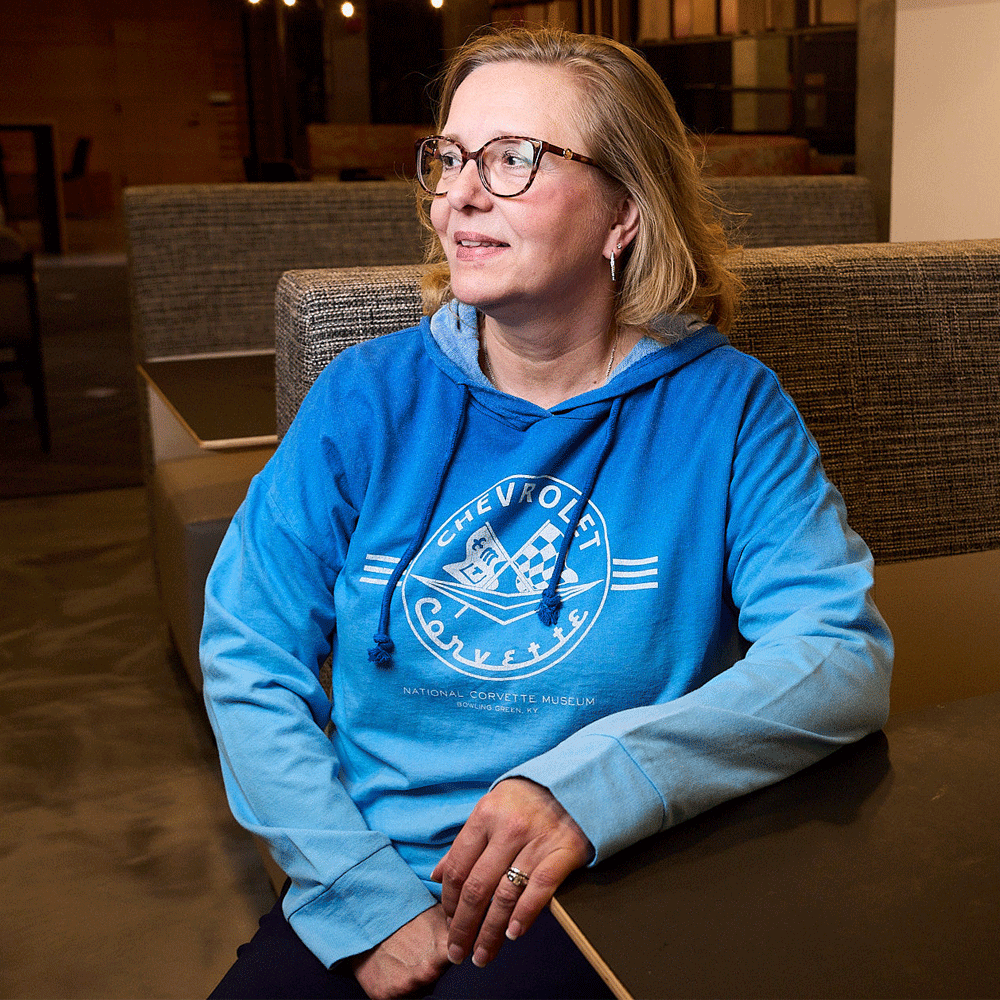Person wearing C1 Corvette Ladies' Tinsley Hooded Pullover