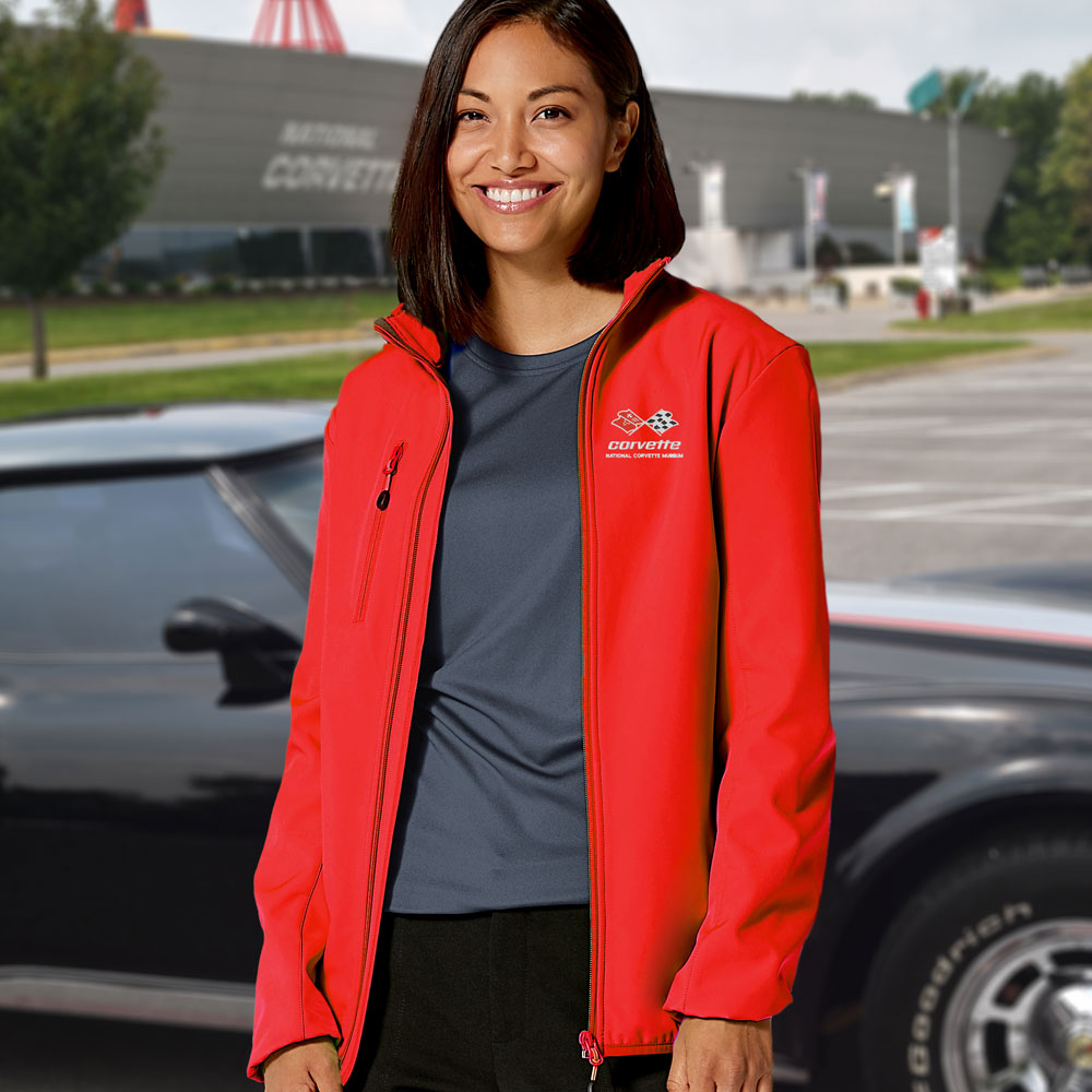 Woman wearing the red C3 Corvette Custom Trail Eco Stretch Softshell Jacket