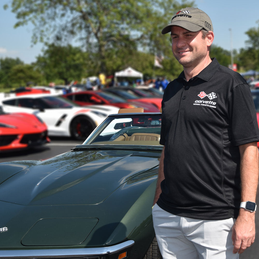 Man wearing the C3 Corvette Mens Ice Pique Black Polo