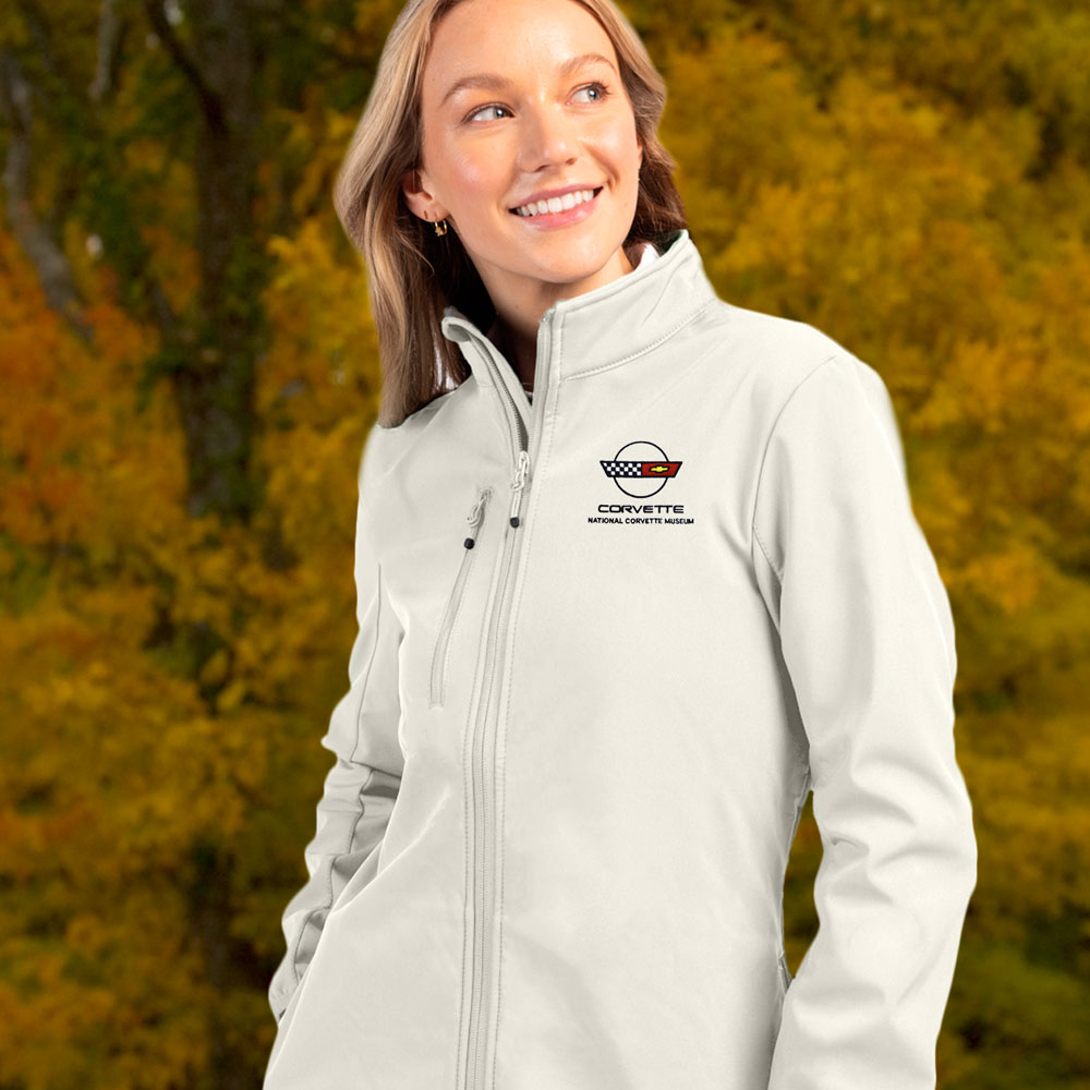 Woman wearing the Fog color C4 Corvette Custom Trail Eco Stretch Softshell Jacket