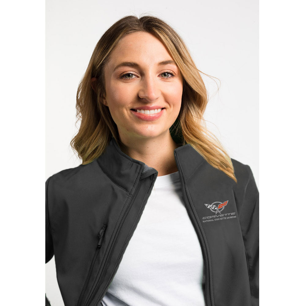 Woman wearing the black C5 Corvette Custom Trail Eco Stretch Softshell Ladies Jacket