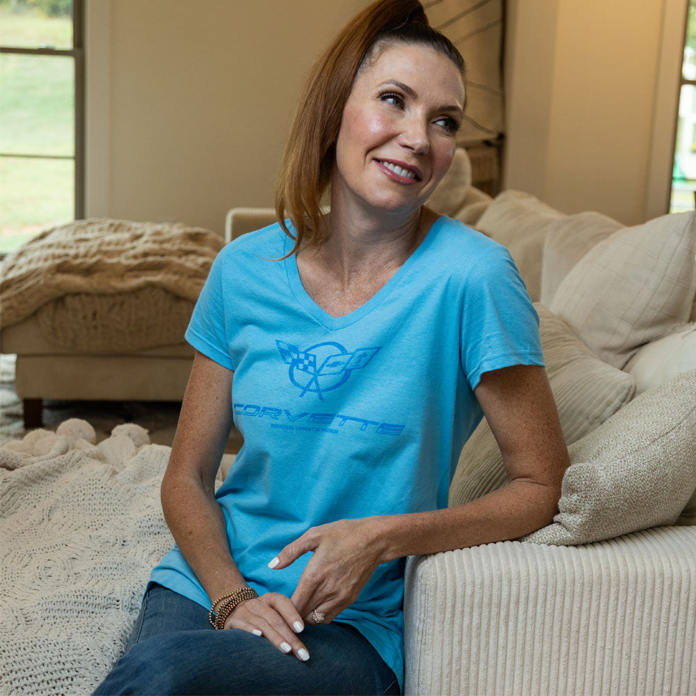 Women sitting on a couch wearing the C5 Corvette Ladies Pacific Blue Glitter Fade Top