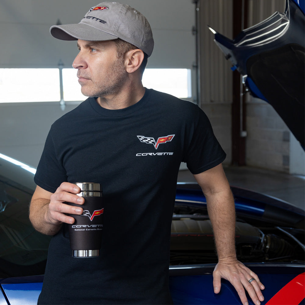 Man wearing the C6 Born in the USA Black Tee showing the C6 emblem on the front