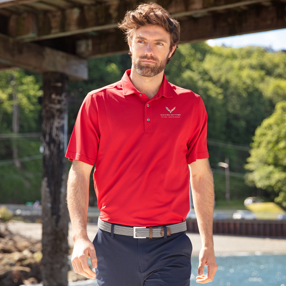 Man standing by a dock wearing the C7 Corvette Custom Virtue Red Polo