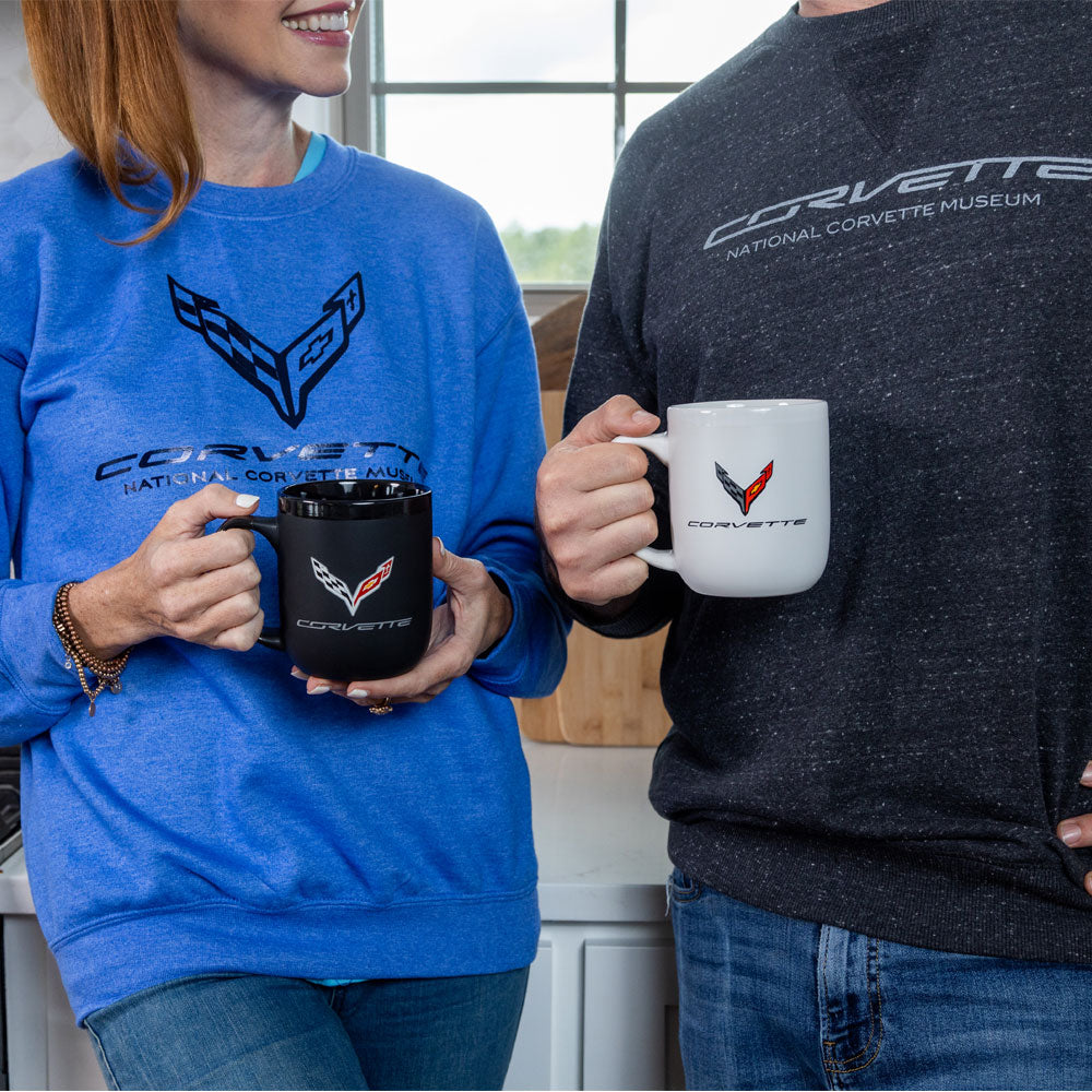 Woman standing in a kitchen holding the C7 Corvette Modelo Coffee Mug