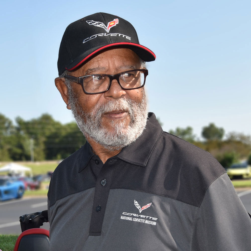 Photo of a man wearing the C7 Corvette Black Sandwich Cap