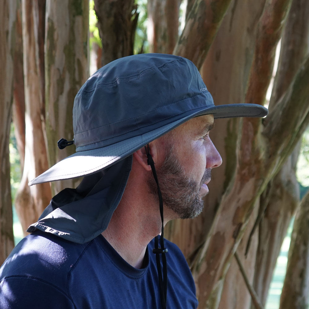 Man wearing the C8 Corvette Charcoal Bucket Hat with the sun flap pulled out