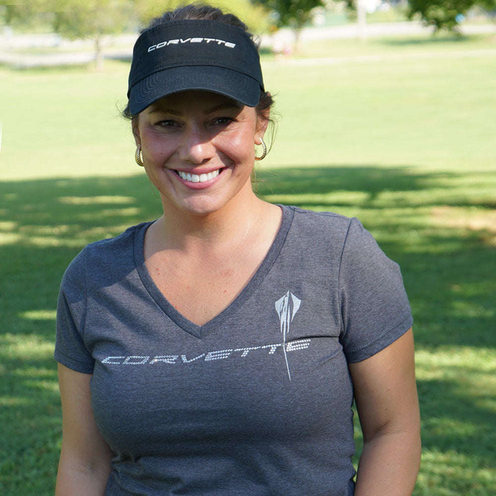 Woman standing in a park wearing the C8 Corvette Crystal Stingray Heather Charcoal Ladies Top