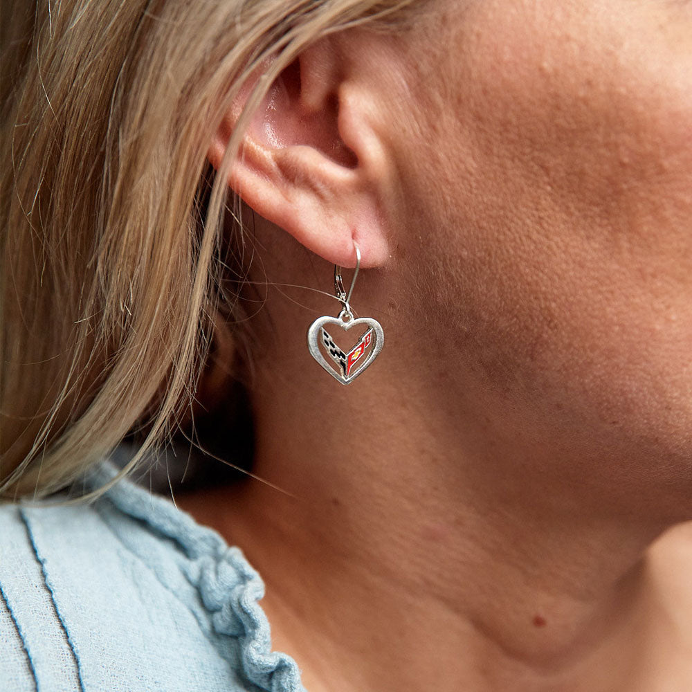 Lady wearing the C8 Corvette Emblem Heart Earrings