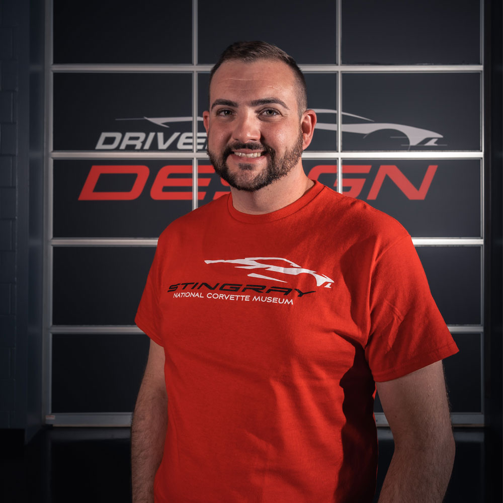 Person wearing C8 Corvette Stingray Gesture T-shirt