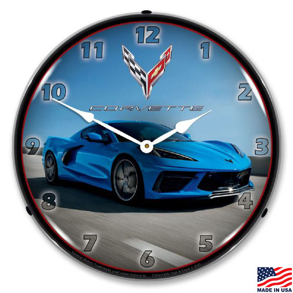 Wall clock with an image of a blue C8 Corvette driving on a road
