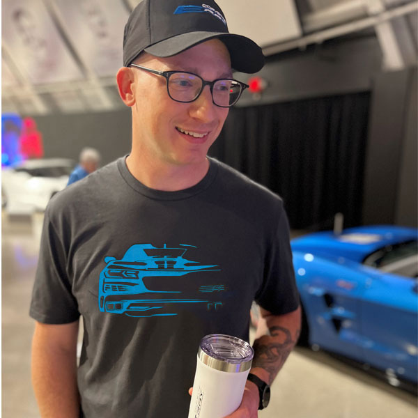 Man wearing the C8 E-Ray Corvette Fade Black T-shirt