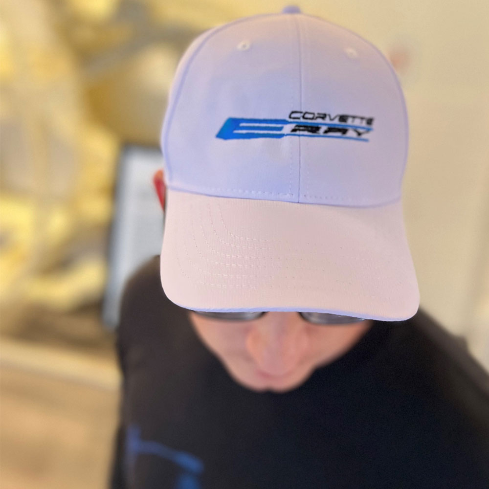 Man wearing the C8 E-Ray Corvette White Performance Cap