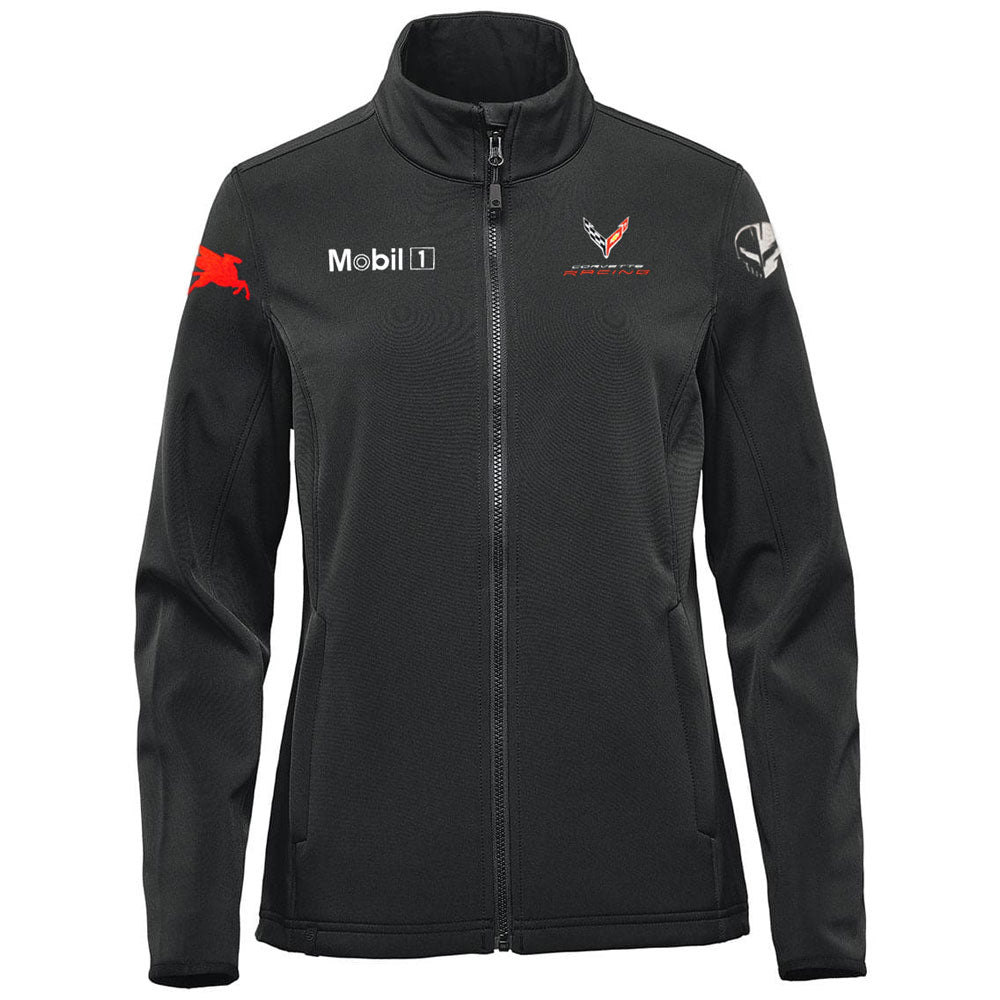 A black zip-up softshell jacket with a high collar, featuring the Mobil 1 logo in white on the right chest, a C8 Corvette Racing logo on the left chest, and a Jake racing logo on the left sleeve, shown against a plain white background.