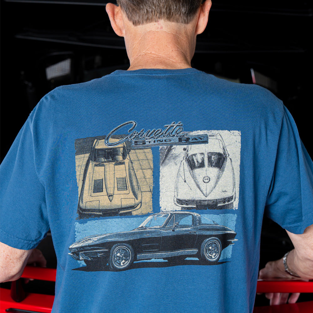Person wearing a blue t-shirt with Corvette Sting Ray graphics on the back.