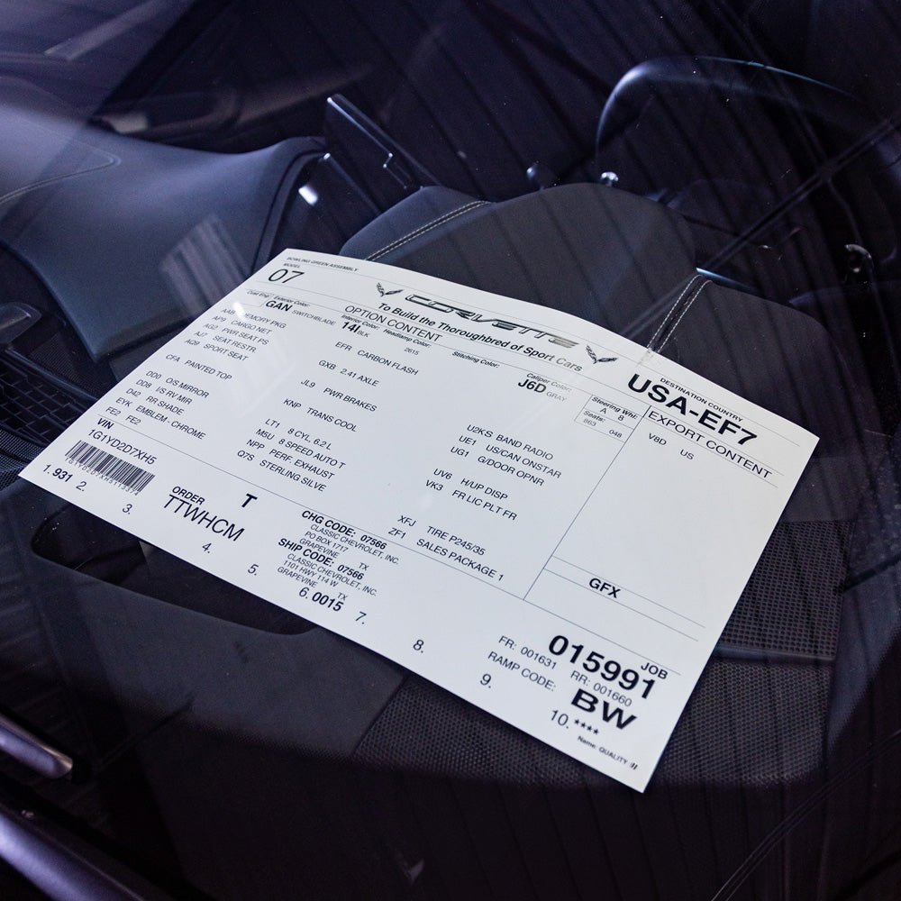 Corvette Build Sheet Displayed on the dashboard of a Corvette