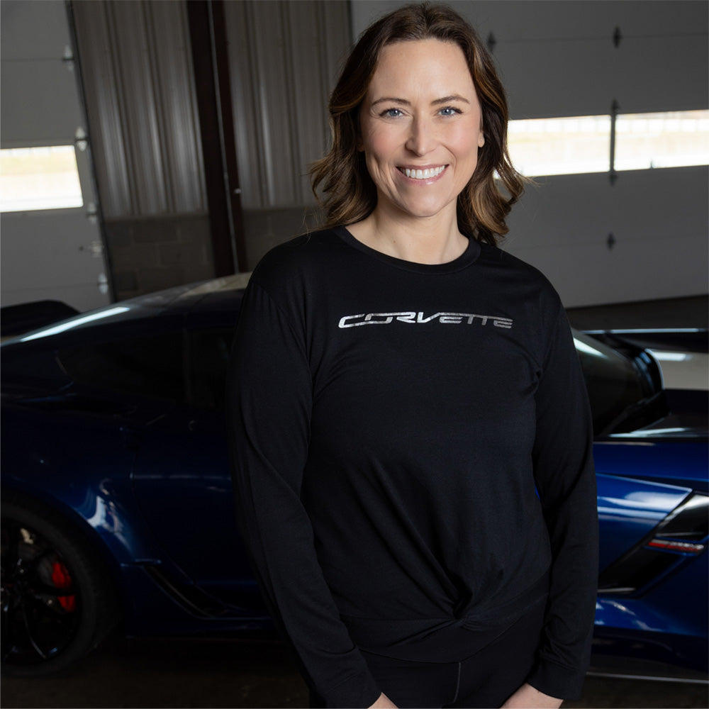 Woman wearing the Corvette Foil Script Ladies Black Twist Front Top
