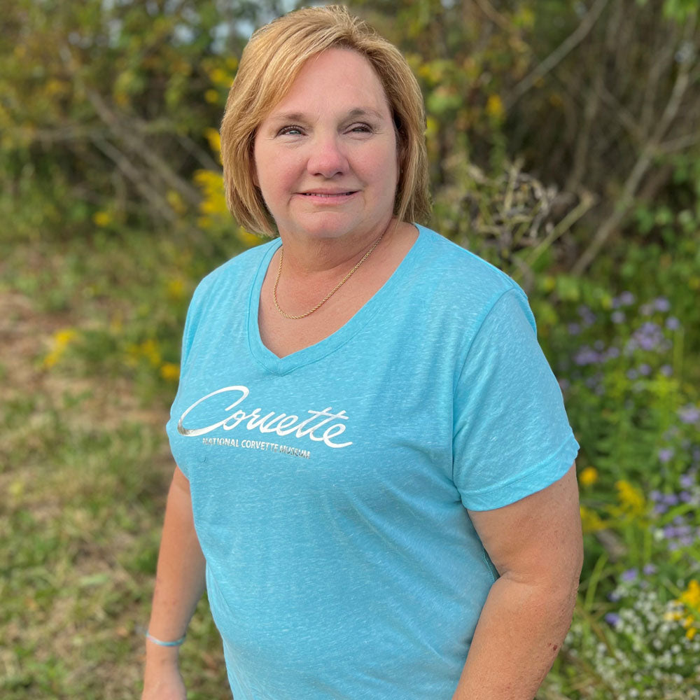 Woman wearing the Corvette Foil Script Ladies Caribbean Top