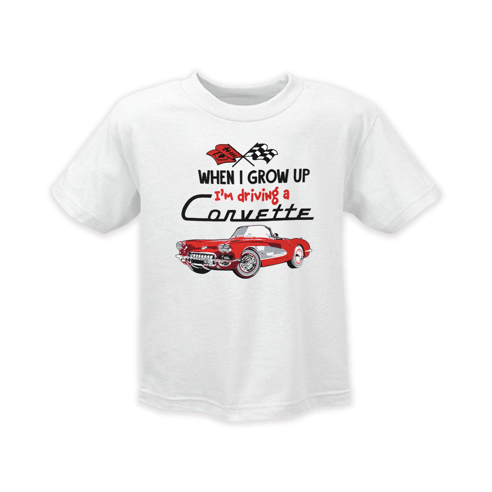 A white toddler tee with a "When I Grow Up I'm Driving a Corvette" graphic that features a red C1 Corvette shown on a white background.