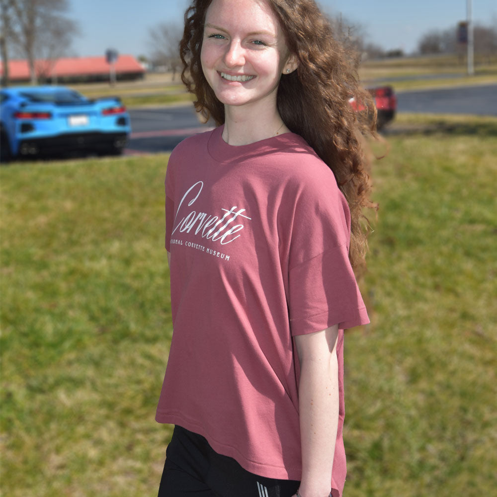 Woman wearing the Corvette Ladies High Low Berry Top