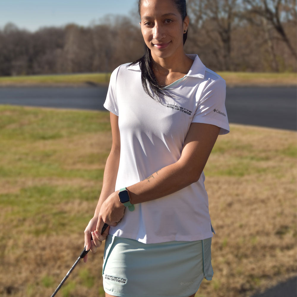 Woman wearing the Corvette Ladies Omni-Wick Front Stage Polo