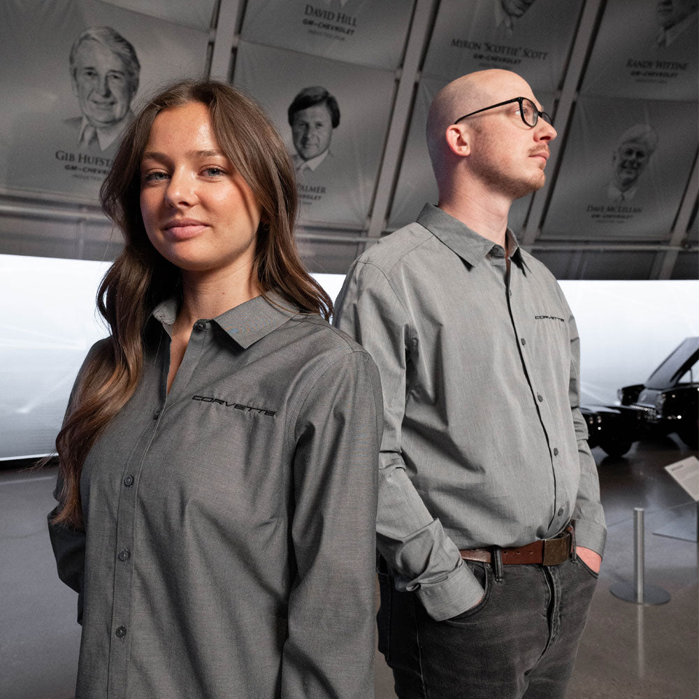 Woman wearing the Corvette Brooks Brothers Black Dress Shirt standing next to a man in the matching shirt