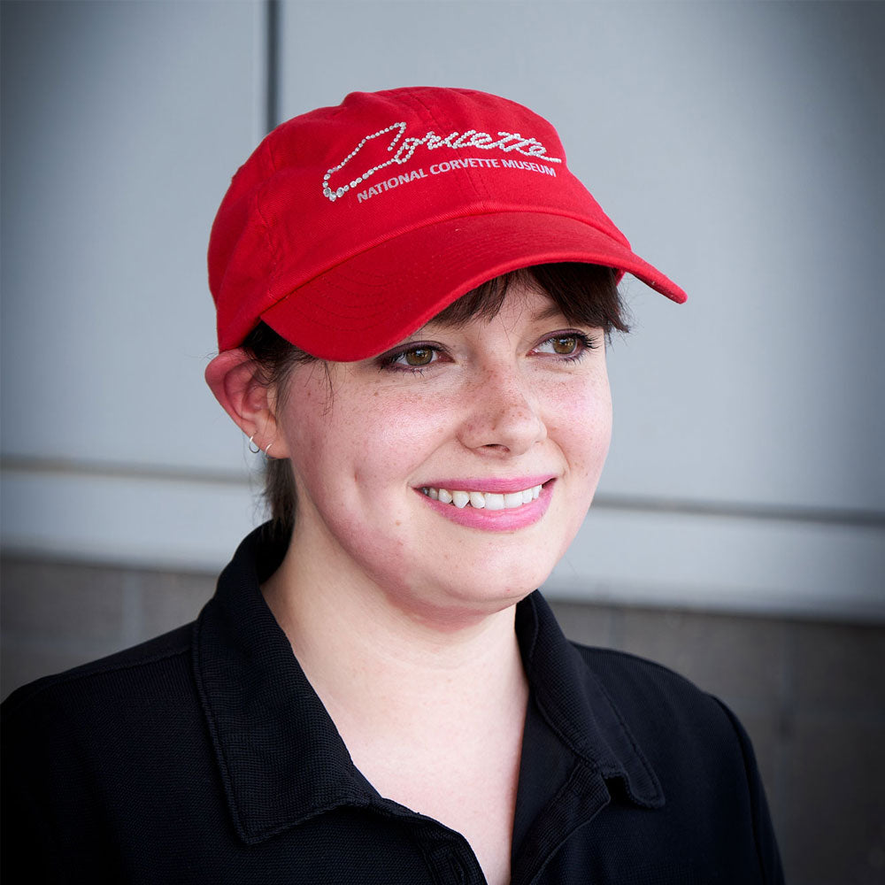 Woman wearing the Corvette Rhinestone Script Red Cap