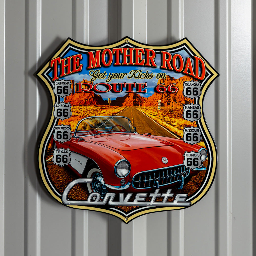 Corvette Route 66 Metal Sign shown hanging on the wall of a garage