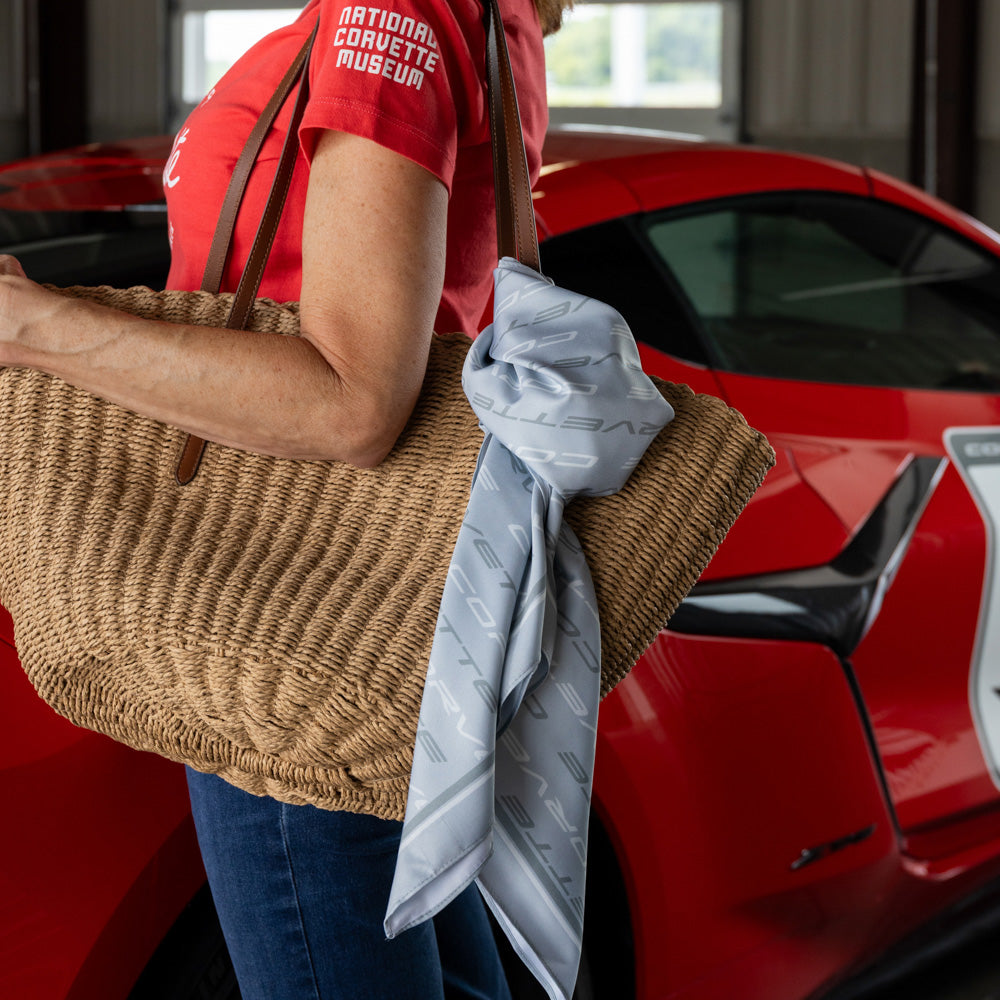 The Corvette Script Light Gray Fashion Scarf tied on a bag