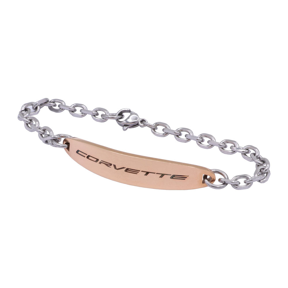 A stainless steel chain bracelet with a polished rose color ID plate engraved with the word 'CORVETTE'.