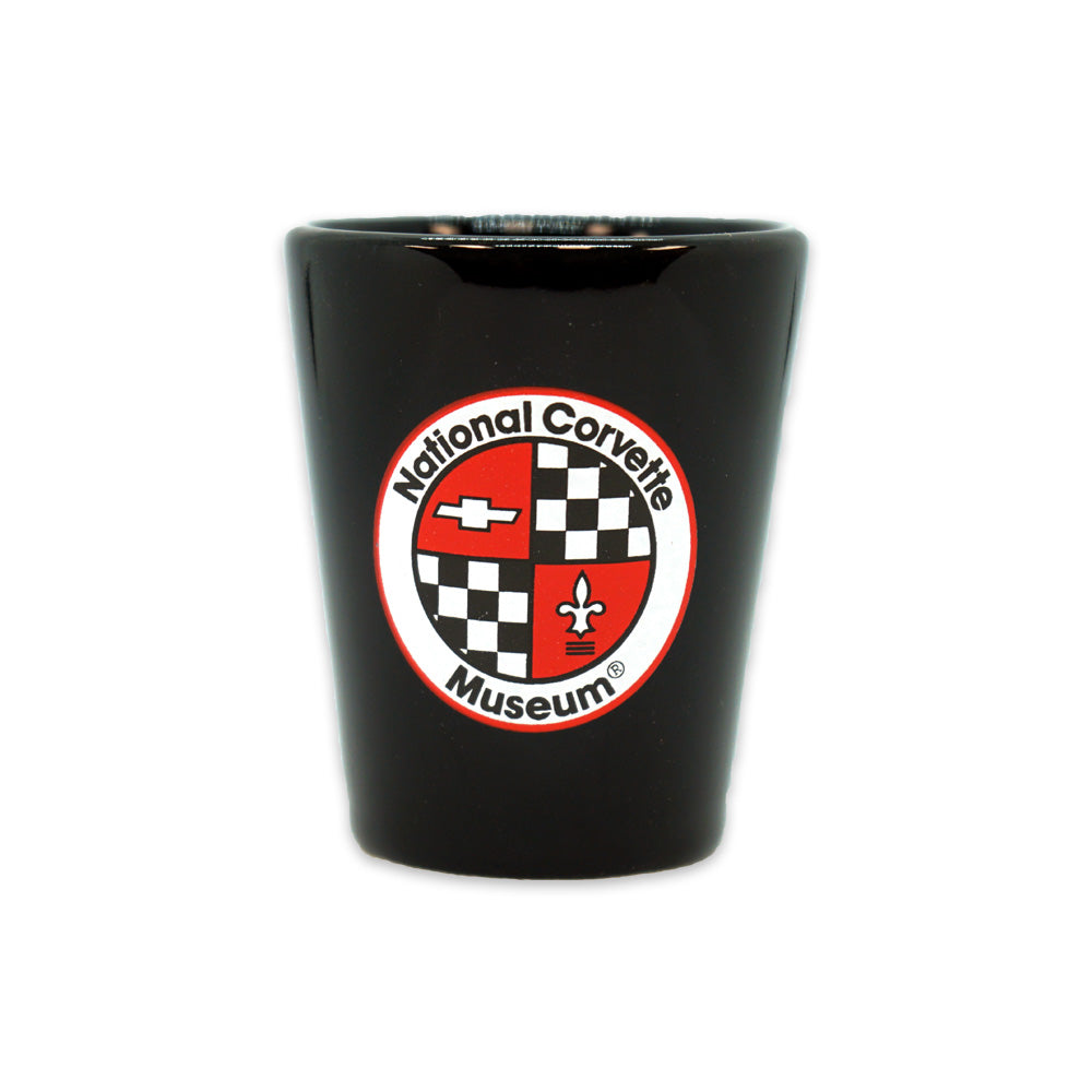 National Corvette Museum Black Ceramic Shot Glass shown on a white background.