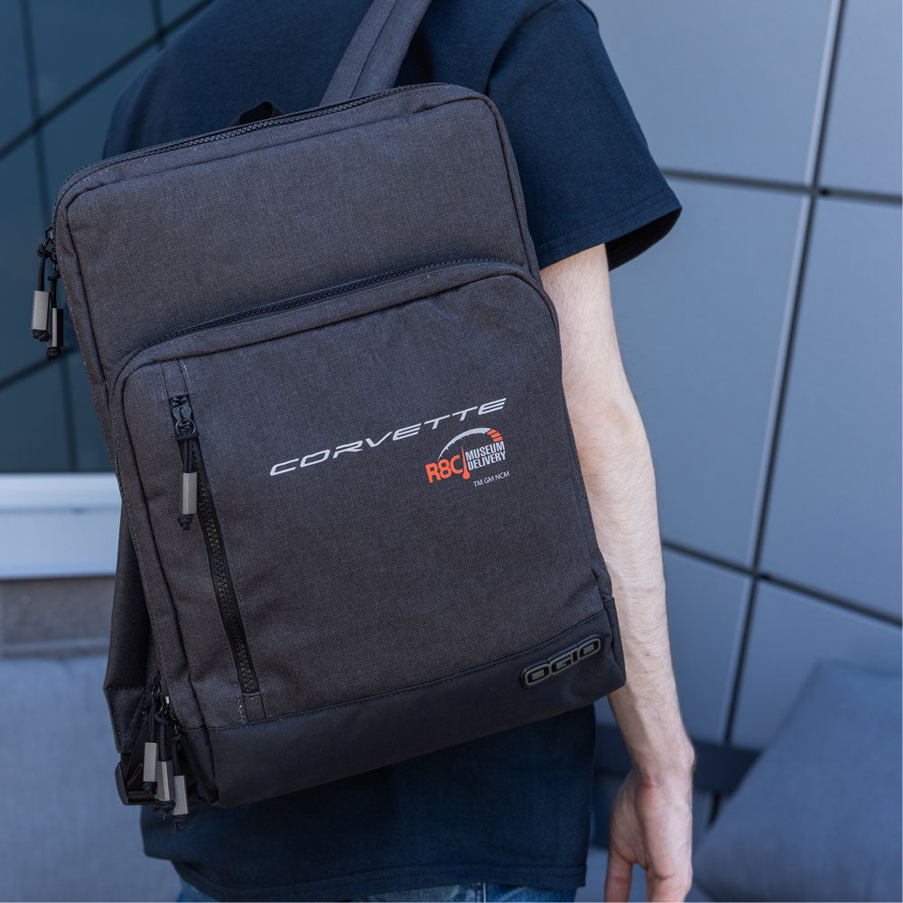 Man walking with the R8C Delivery Ogio Sly Pack Backpack