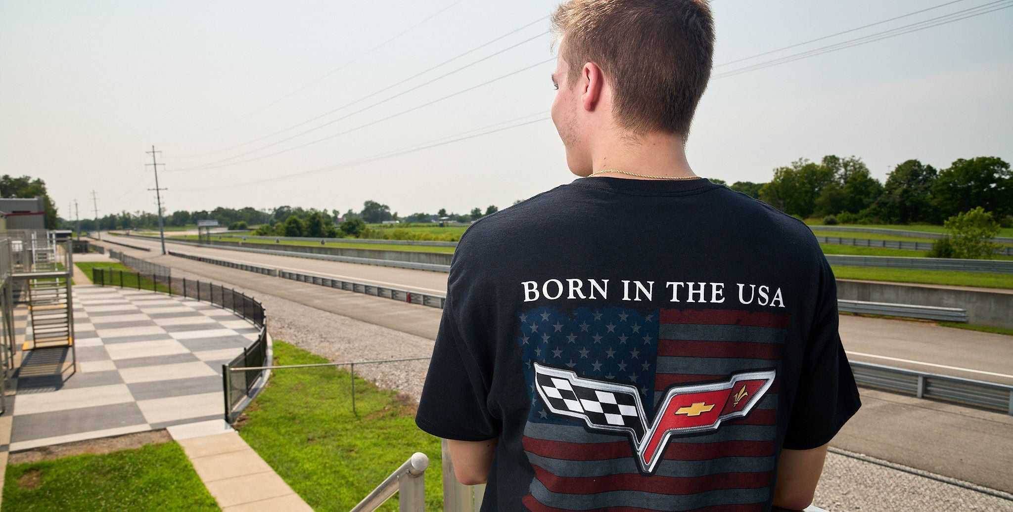 man wearing Corvette t-shirt at the track