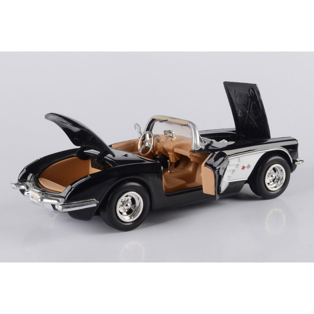 The 1959 Corvette Black Diecast Model shown with the hood, doors and trunk open on a white background.