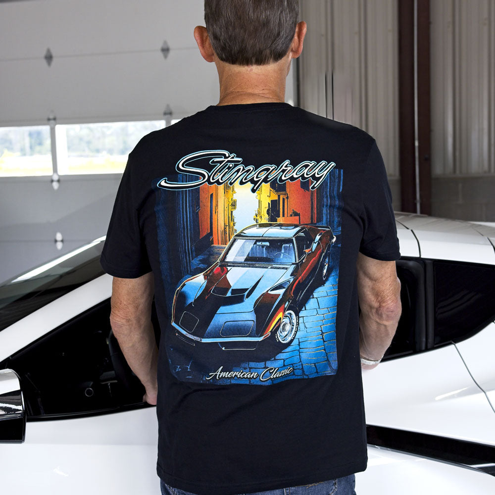 Man wearing the a black Corvette tee showing a black 1972 Corvette on the back.