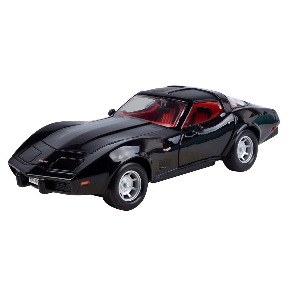 Black diecast model of the 1979 Corvette in a one twenty four scale shown on a white background