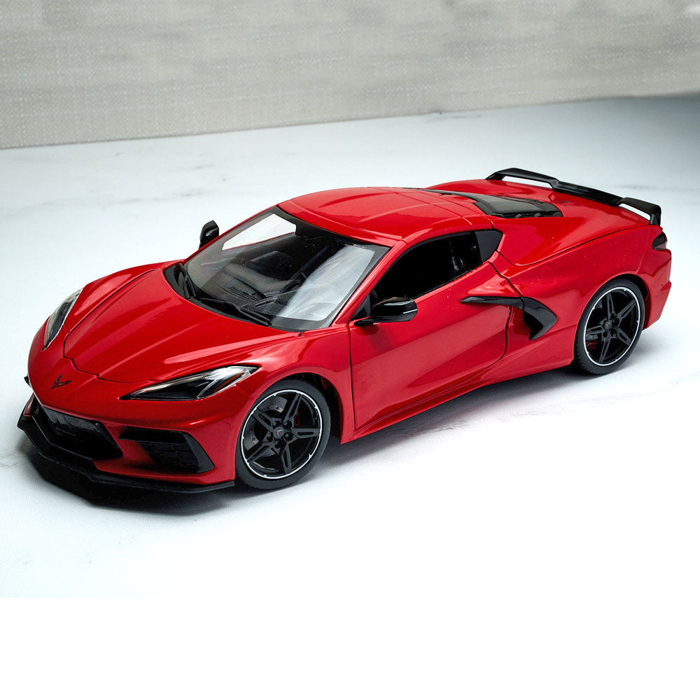 2020 Corvette Stingray Torch Red Diecast Model sitting on a table